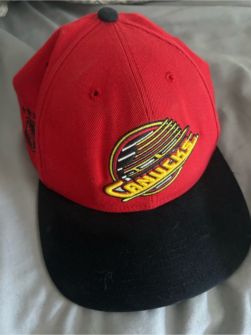 Vancouver Canucks Red and Black Baseball Cap with Embroidered Skate Logo